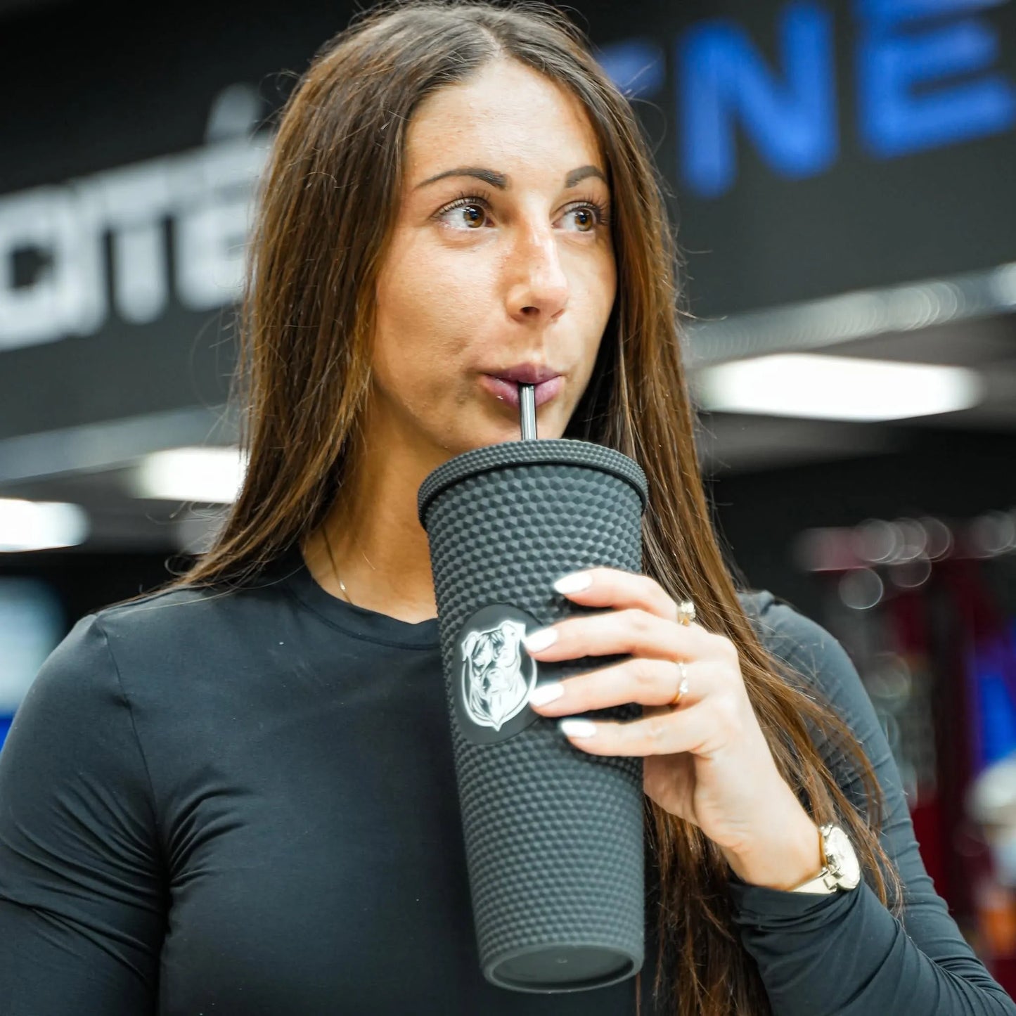 Plastic cup with straw