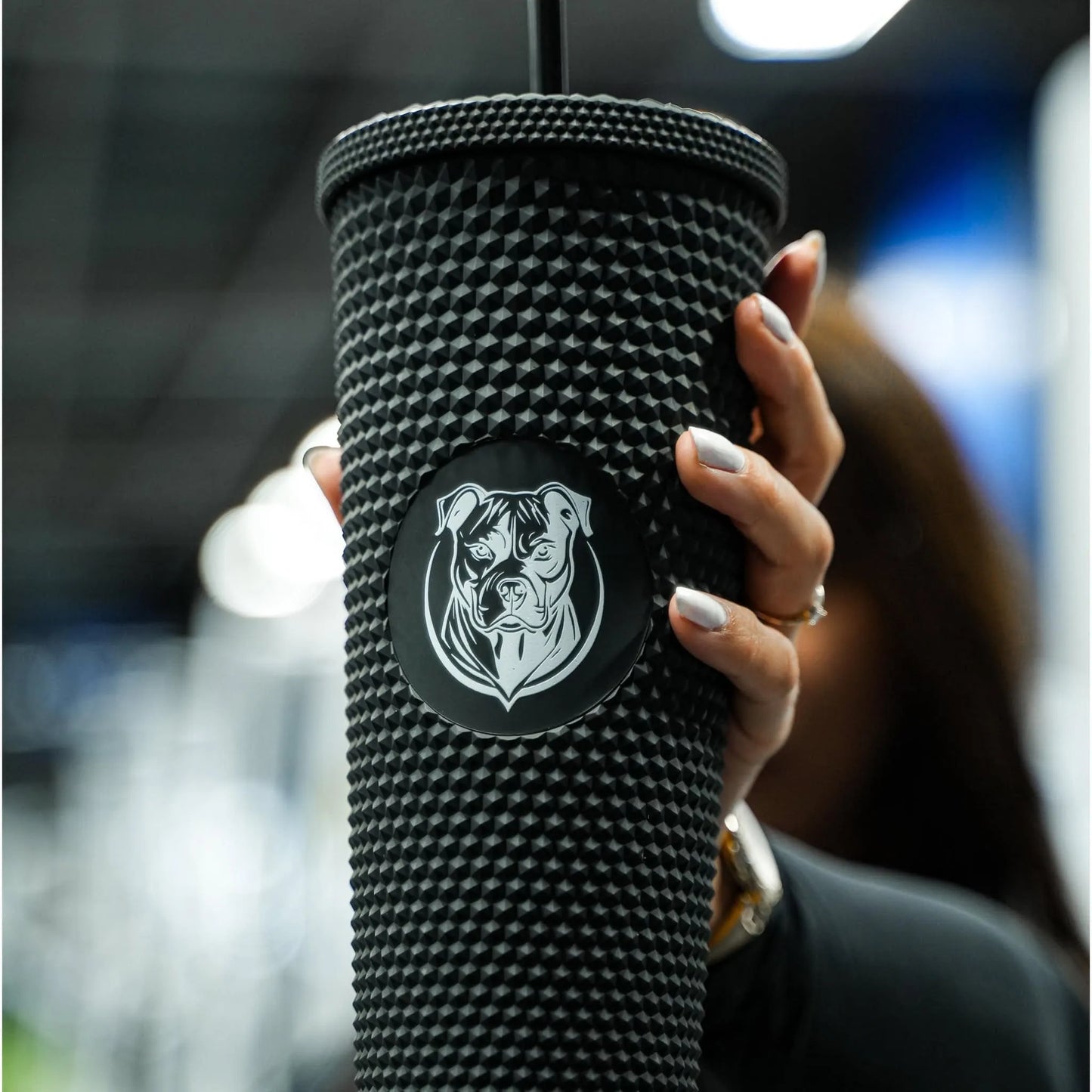 Plastic cup with straw